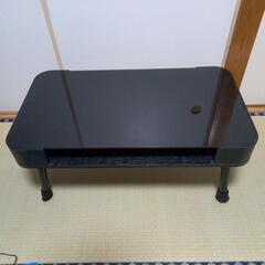 黒色のガラスローテーブル(天板下物入)