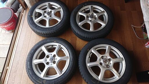 155 65R/14サイズの新品未使用タイヤと中古アルミホイールのセット 