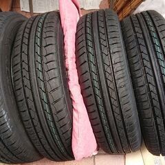 155 65R/14サイズの新品未使用タイヤと中古アルミホイールのセット