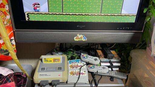 写真中ゲーム本体とソフト