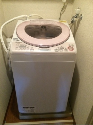 洗濯 乾燥機 洗濯機乗せる土台あり。