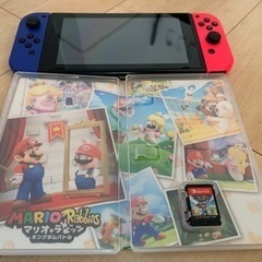 任天堂　Switch (本体とコントローラー×2.カセット)