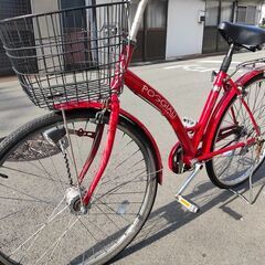 赤い自転車です。26インチ。前かごあります。鍵は新品で3本ありま...