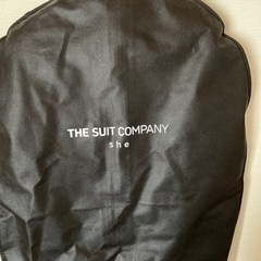 THE SUIT COMPANY