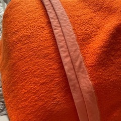 オレンジ色敷毛布