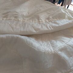 Satin bed cover with embroidery