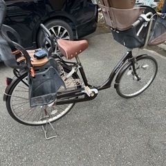 ３人乗る自転車