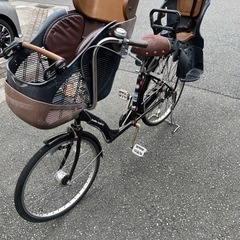 ３人乗る自転車