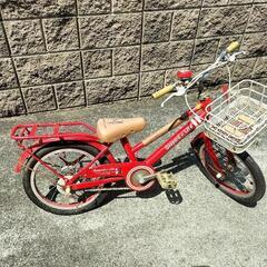 赤い自転車(パンクあり)