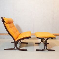 IDC OTSUKA(大塚家具) で取り扱われていたファルコン 本革ハイバックチェア/オットマンです。伸びやかなバックフレームとヘッドレストが深い安らぎを与えてくれるレザー パーソナルチェアです。DH117