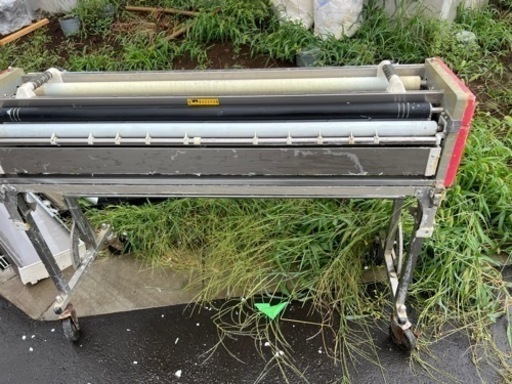 クロス糊付け機