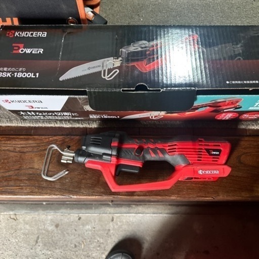 京セラ、旧RYOBI、 ほぼ新品です。18Vコードレスノコギリ、充電器、バッテリー付き。