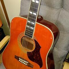 Epiphone by Gibson   HummingBird...