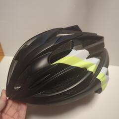 新品未使用　自転車　ヘルメット　サイズL  袋と電池付き