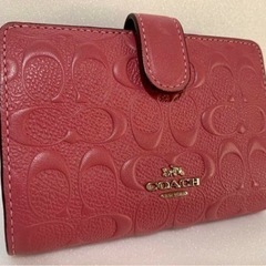 COACH  二つ折り財布 ラグジュアリー デボスド シグネチャ...