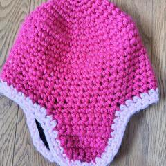 ピンク毛糸の帽子