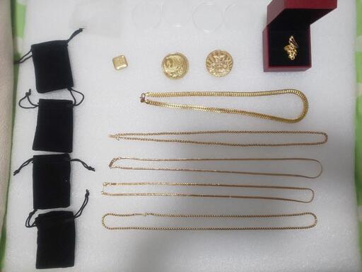 金ネックレスと指輪と記念コインのセット