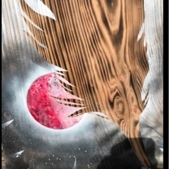 一枚板に羽の絵