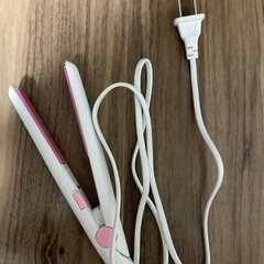 開封済み未使用ヘアアイロン。