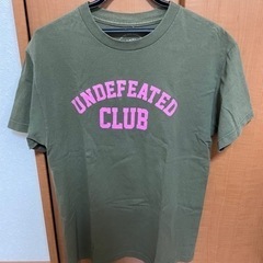 【ネット決済・配送可】UNDEFEATED × ASSC Tee...