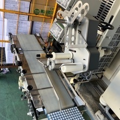 自動上下シール貼り機