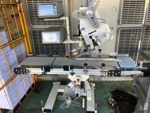 自動上下シール貼り機