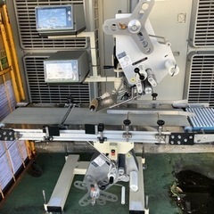 自動上下シール貼り機