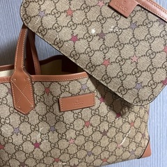 GUCCIミニポーチ付き