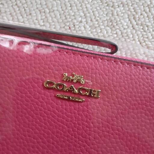COACHの長財布　ピンク