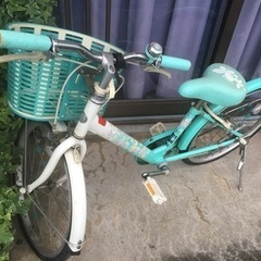 自転車　水色　女の子　小学生