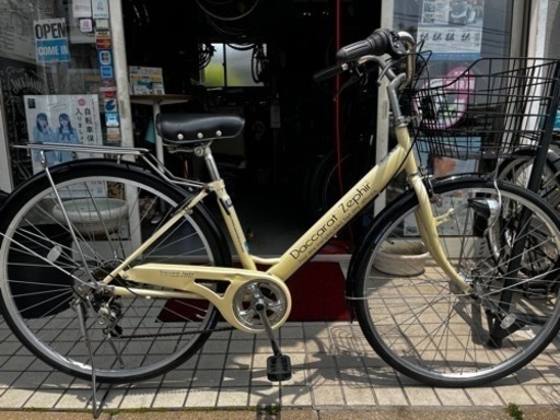 26インチ のベージュのママチャリ