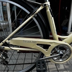 26インチ のベージュのママチャリ