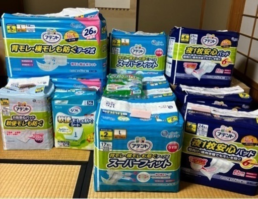 ①総額22000円分　大人用おむつ・パッド等　介護・アテント　・夜1枚安こころパット仰向け・横向き寝でも漏れを防ぐ6回九州24枚　・背モレ・横モレも防ぐ薄型スーパーフィットテープL17枚　・消臭効果付テープ式　L26枚背モレ・横モレも防ぐ　・お肌安心パッド　軟便モレも防ぐ16・・リフレ　軟便モレを防ぐシート　36枚入