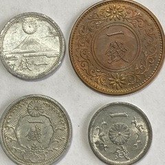 古い1銭硬貨4枚