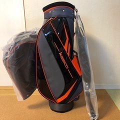 新品！Kasco ゴルフ　バッグ　キャディバッグ　黒×オレンジ×カーボン調　フード・ストラップ付　オークション出品中
