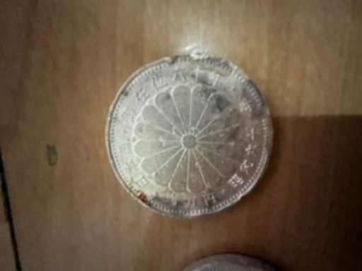 一万円硬貨売り