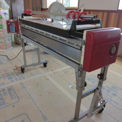 自動クロス糊付機