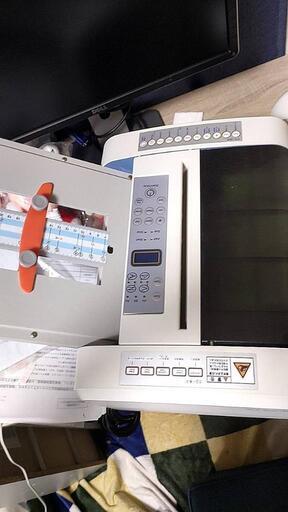 自動紙折り機