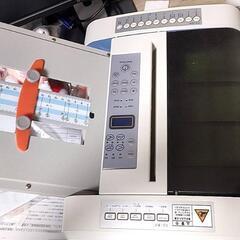 自動紙折り機