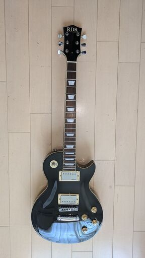 ◆RDRエレキギターレスポール＋新品弦（２セット）＋ピック（数個）＋ギタースタンド1台＋新品キクタニ譜面スタンド1台◆