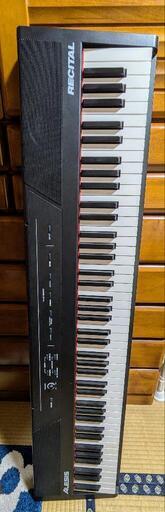 ALESIS 電子ピアノ 88鍵盤 初心者向け スピーカー搭載 譜面台付き フルサイズ・セミウェイト鍵盤 Recital ブラック