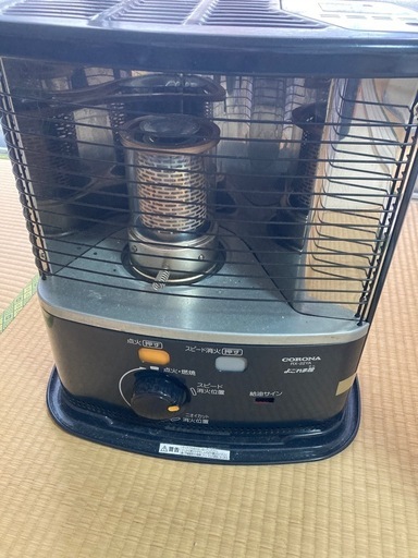 灯油ストーブとポリタンク、手動ポンプ